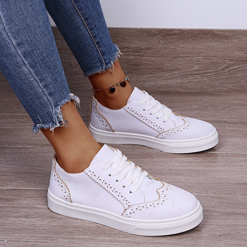 Elegantes zapatillas planas con cordones