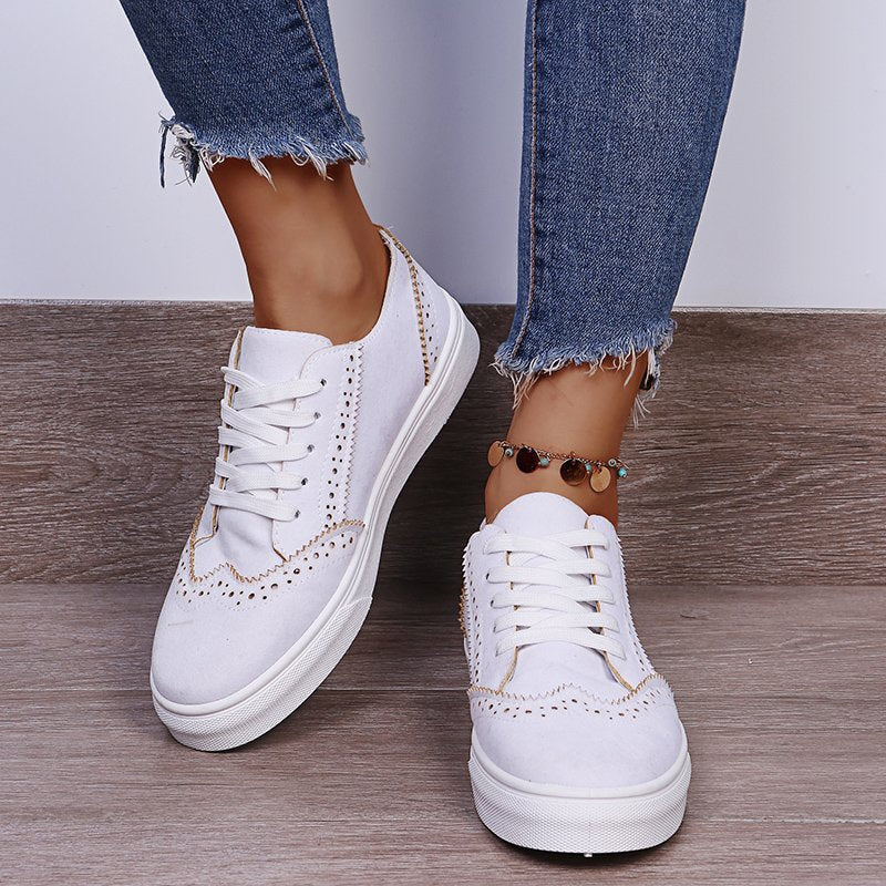 Elegantes zapatillas planas con cordones