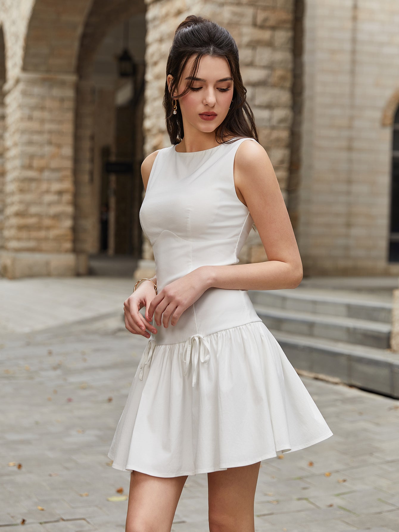 Bow Tie Embellished Sleeveless Pleated Mini Dress