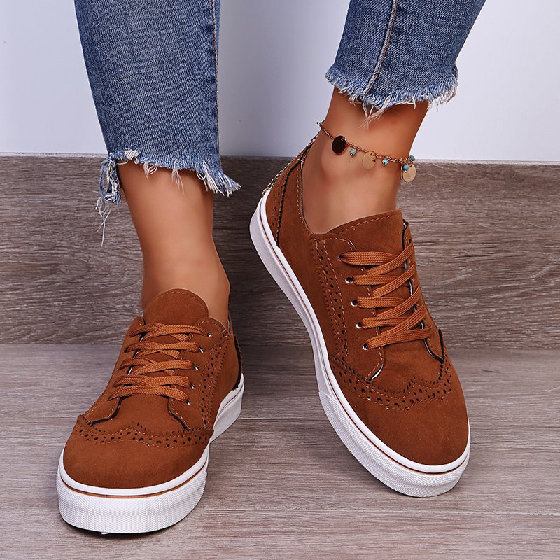 Elegantes zapatillas planas con cordones