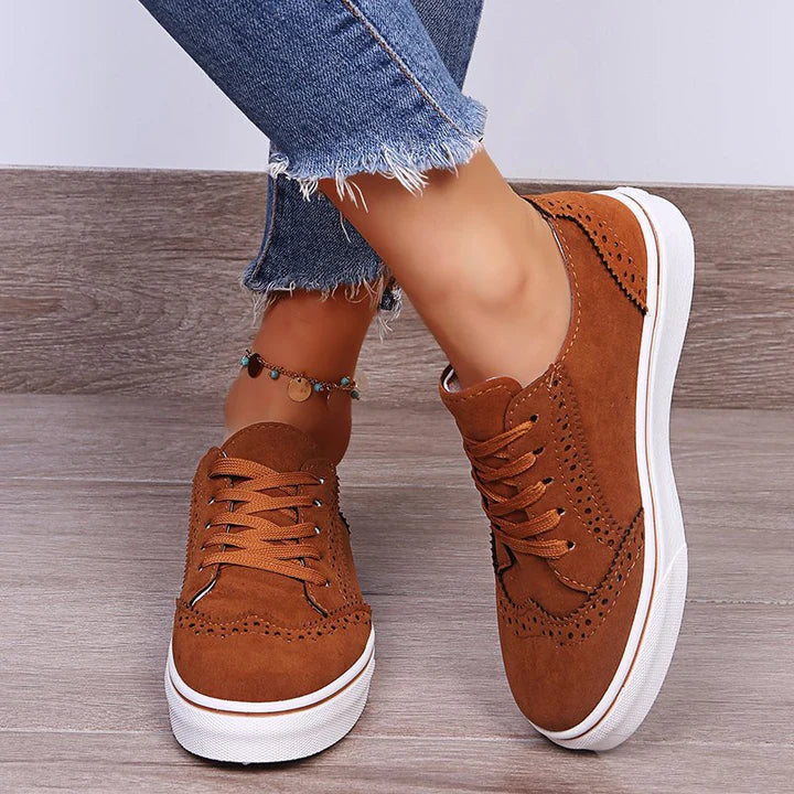 Elegantes zapatillas planas con cordones